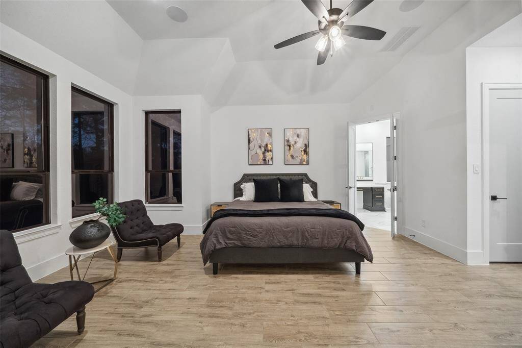 Spacious and serene primary bedroom on first floor