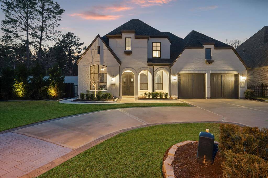 Situated on a prime cul-de-sac lot with golf course bordering the back and side of the property