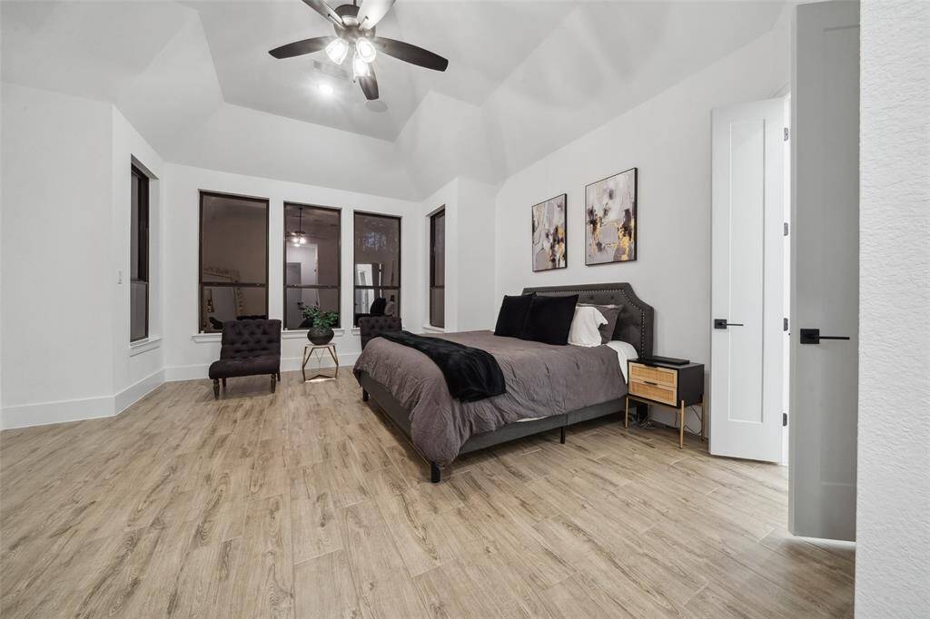 Primary bedroom offers plenty of room to relax and unwind