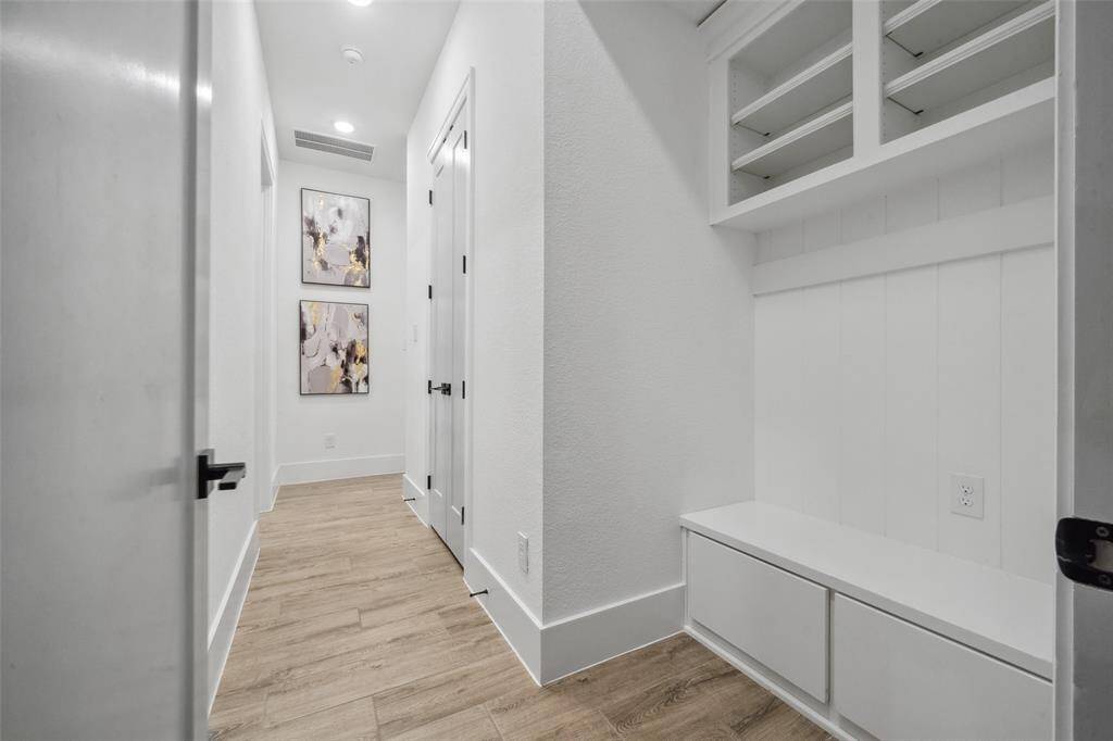 Abundance of storage space conveniently off of garage