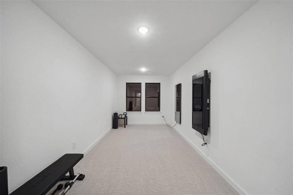 Additional room added to the floor plan makes a perfect workout space or second office