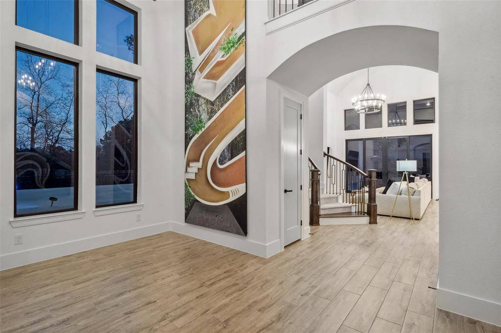 Tinted windows throughout the house provide privacy and energy efficiency while offering unobstructed views