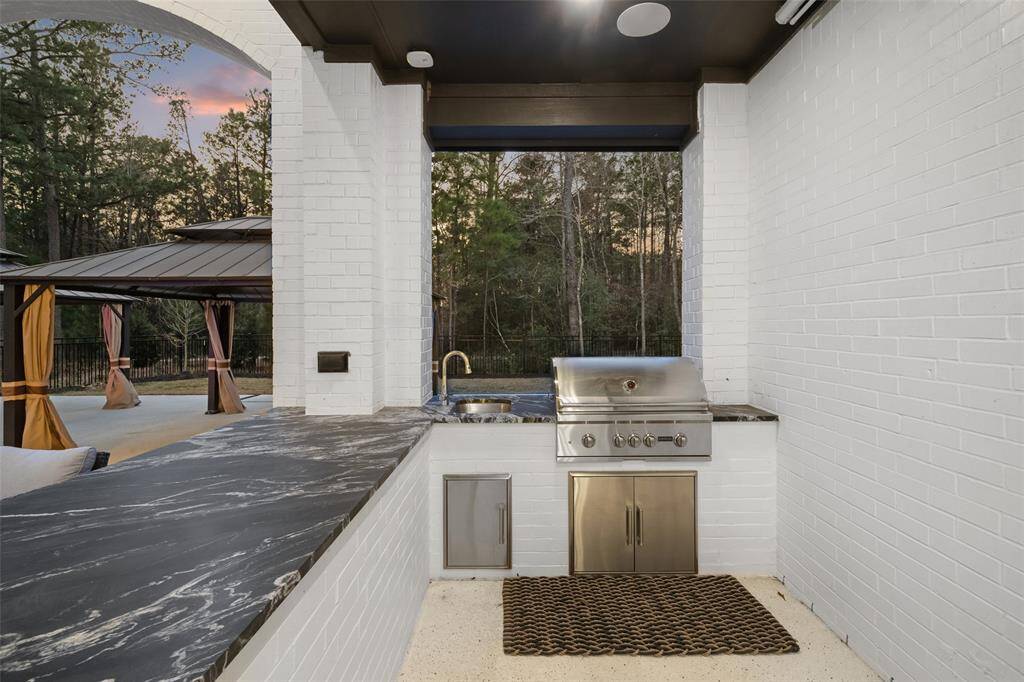 Outdoor kitchen perfect for hosting friends or enjoying a peaceful evening