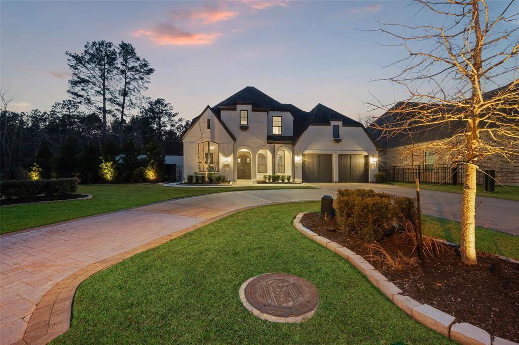 Circular drive leading to oversized 3 car garage