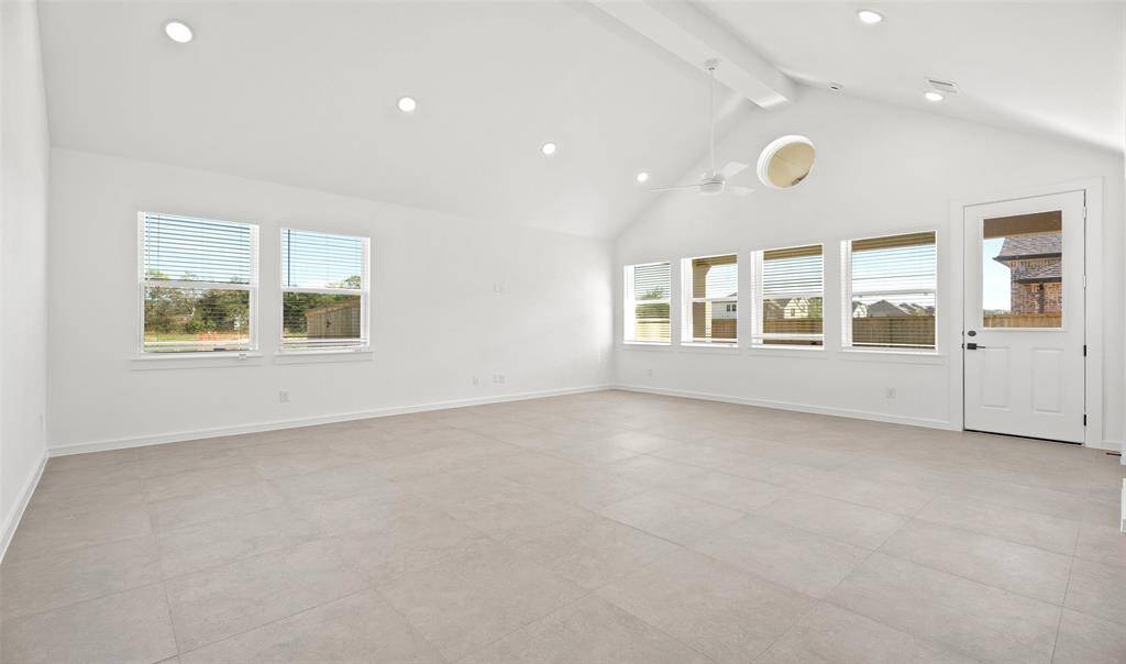 Impressive dining area and great room with high vaulted ceilings (*Photo not of actual home and used for illustration purposes only.)