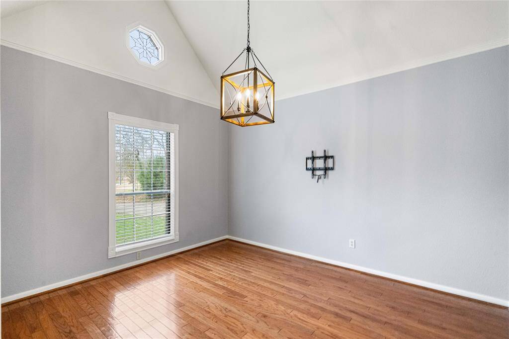 Front room that can be used as a formal dining room, study, or office.