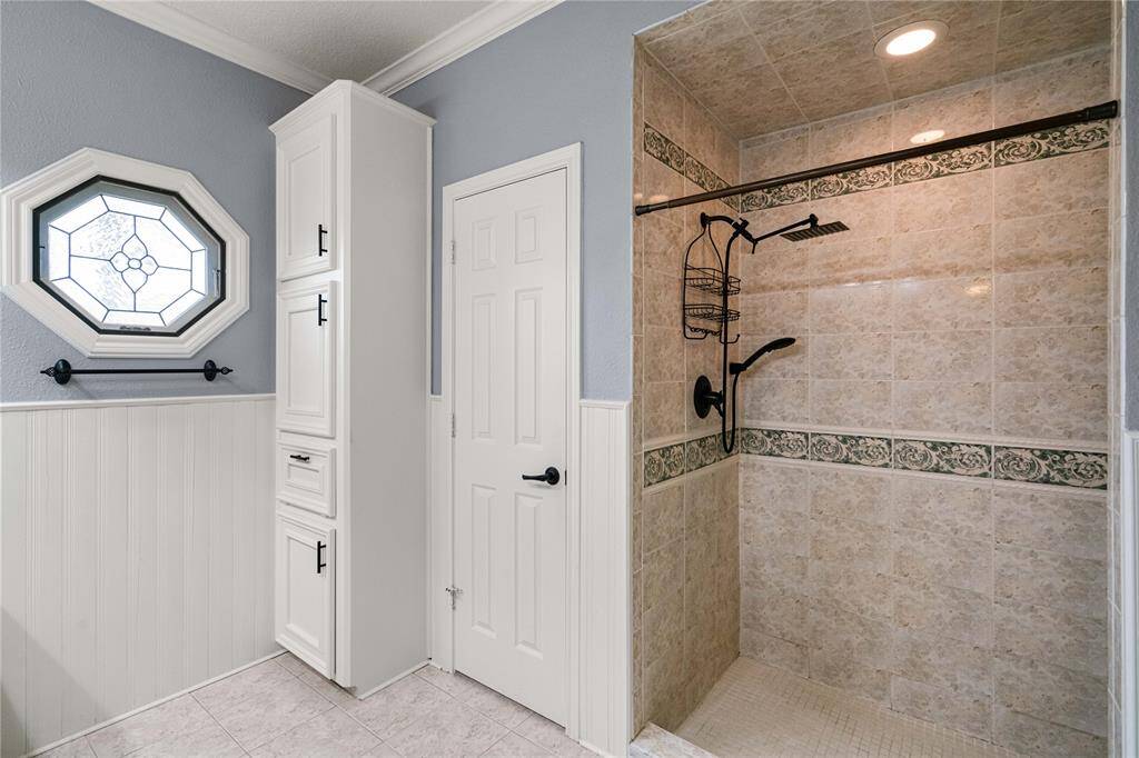 Primary bathroom with a view of the walk-in shower