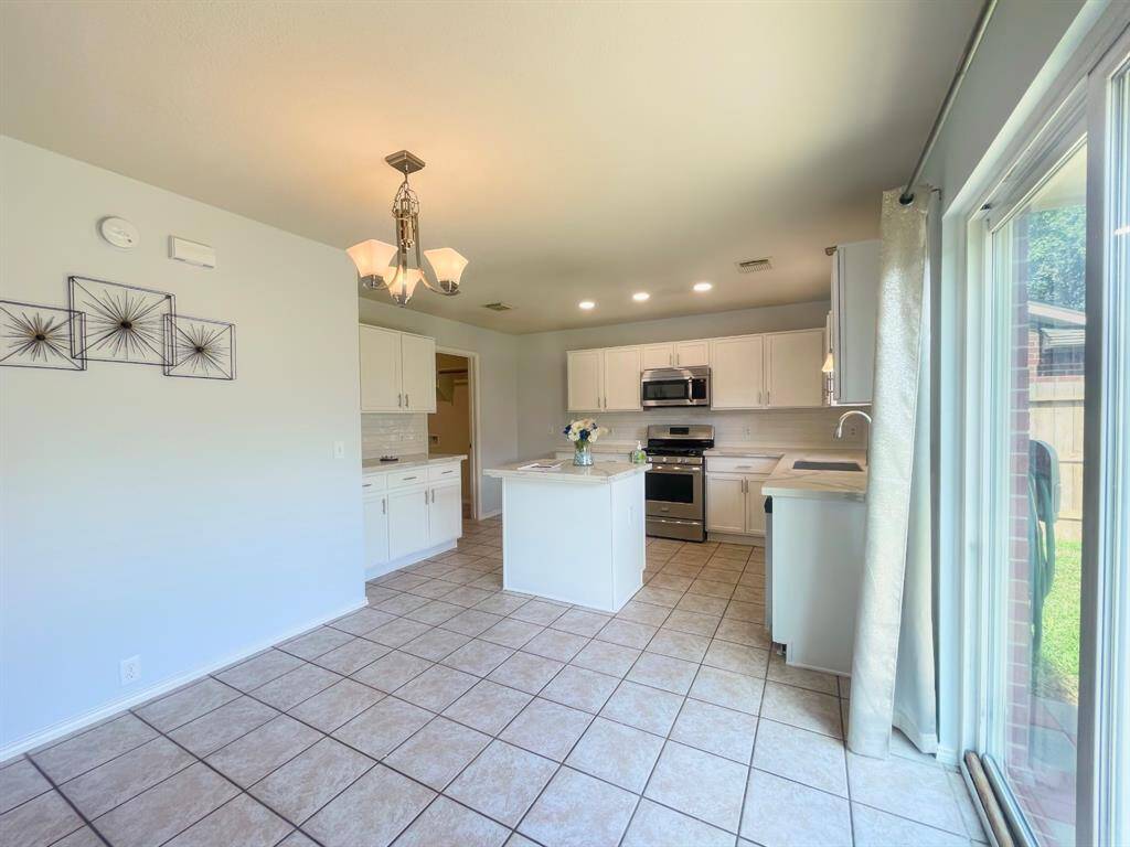 Remodeled kitchen with custom quartz counters