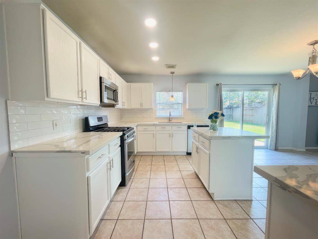 Remodeled kitchen with custom quartz counters