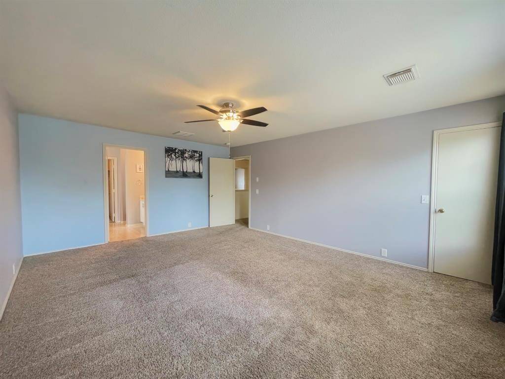 Huge primary bedroom with private primary bath and walk-in closets
