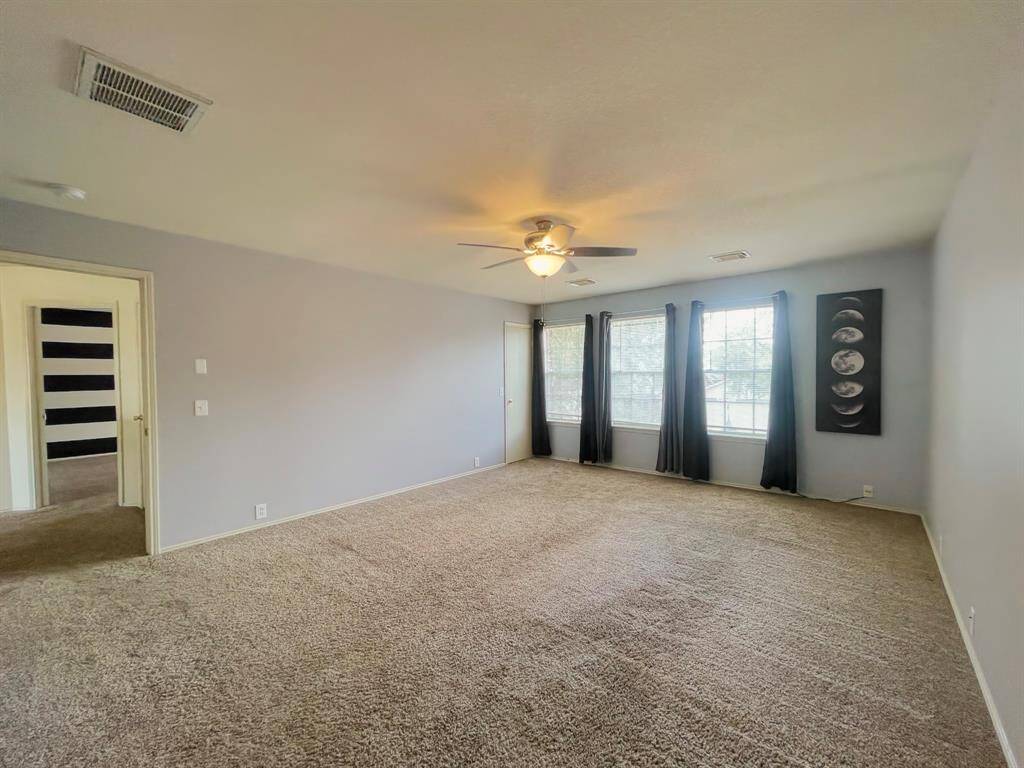 Huge primary bedroom with private primary bath and walk-in closets