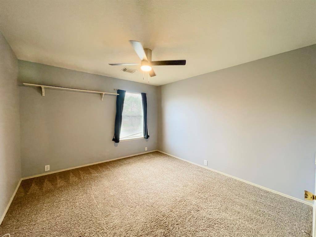 Third bedroom with tons of lighting