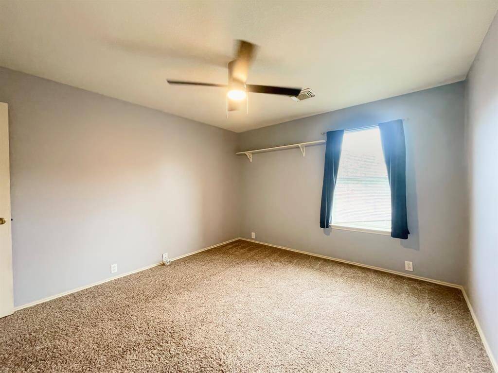 Third bedroom with tons of lighting
