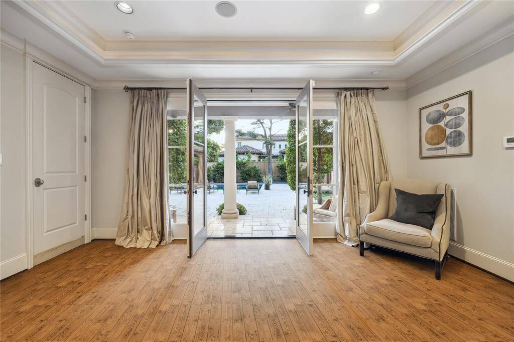 When you're ready to take a dip, the French doors open to the pool.