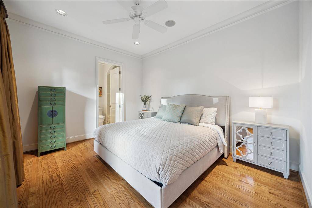 This guest en-suite bedroom, located at the top of the stairs, easily accommodates a king-sized bed.