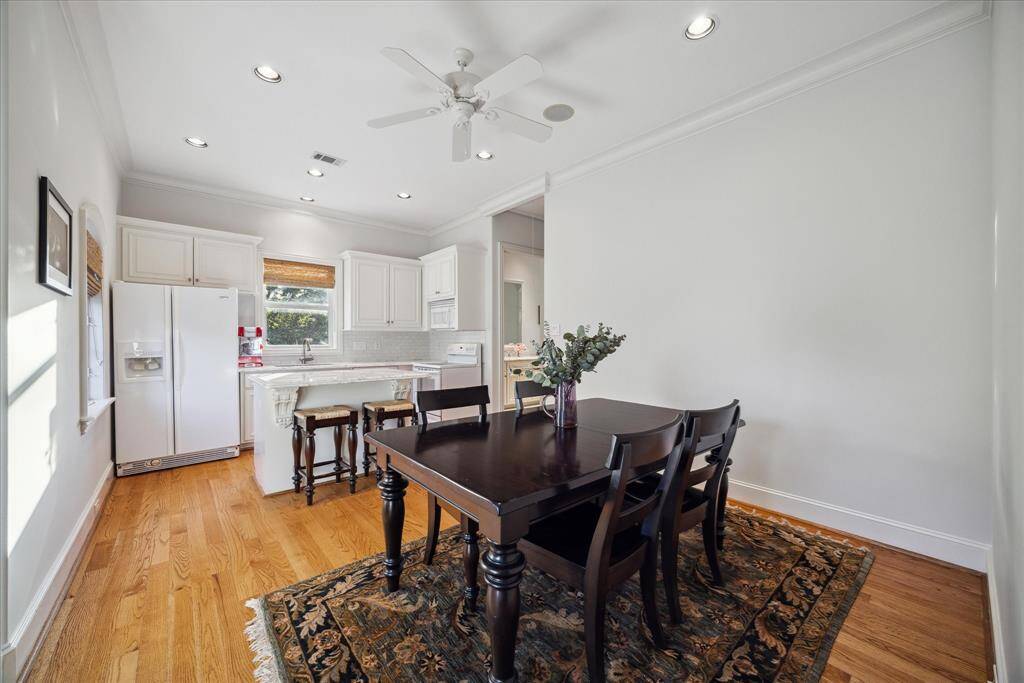 The home even has a separate quarters with its own living area and full kitchen.  Separate bedroom just down the hall beyond the cased opening.