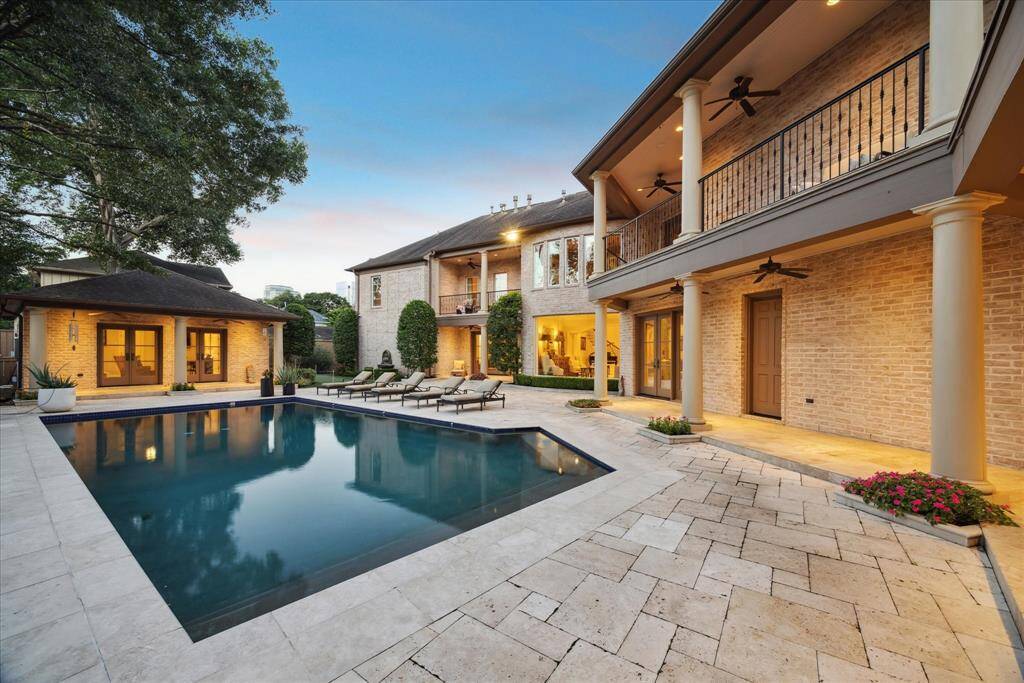 The beautiful heated pool measures 36' by 17' and is perfect for swimming laps or just lounging.  Note the separate casita just beyond the pool.