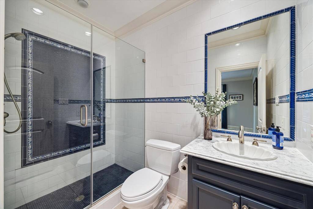 The casita's full bath is beautiful in blue and easily accessible from the pool area.