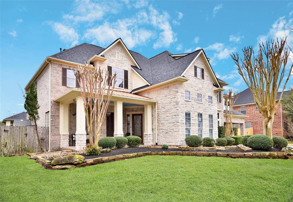 This Village Builders home features access to Kingwood's many community amenities, a 2024 roof, outdoor kitchen, gorgeous pool and large 11,000+ SF lot.
