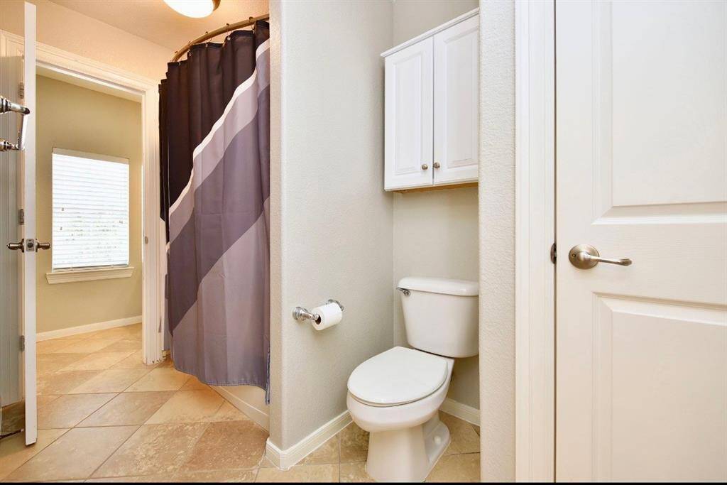 The secondary bathrooms are ideally located off of the secondary bedrooms and  ahve large vanities and shower/tub combos.
