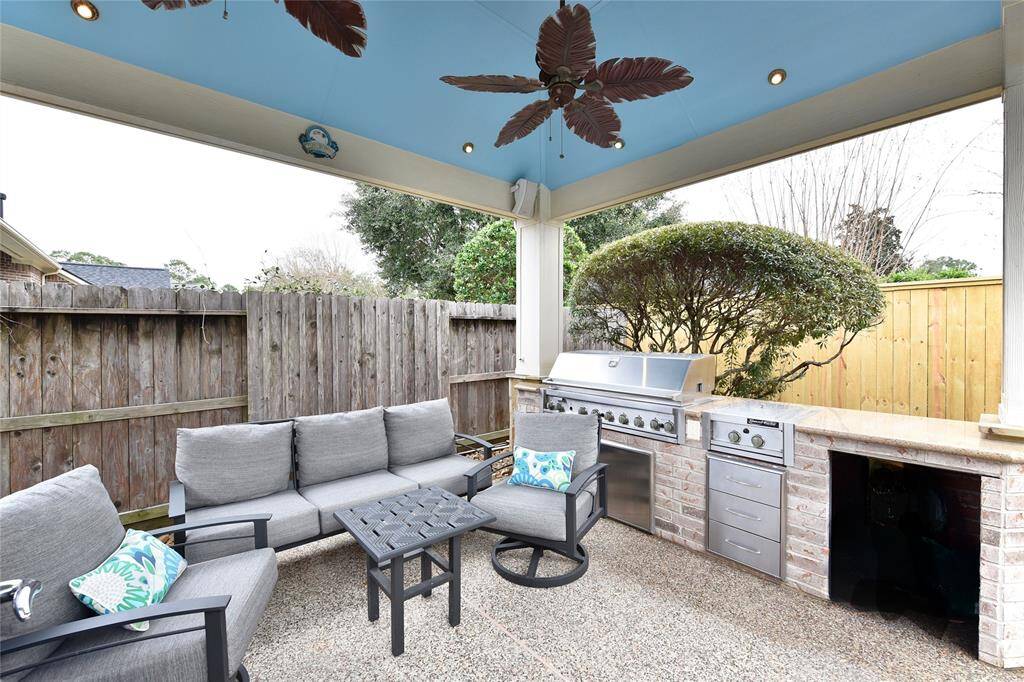 This backyard retreat is feature rich with a covered patio, covered outdor kitchen and inviting pool with sunshelves perfect for hosting guests and creating poolside magic moments with the family.