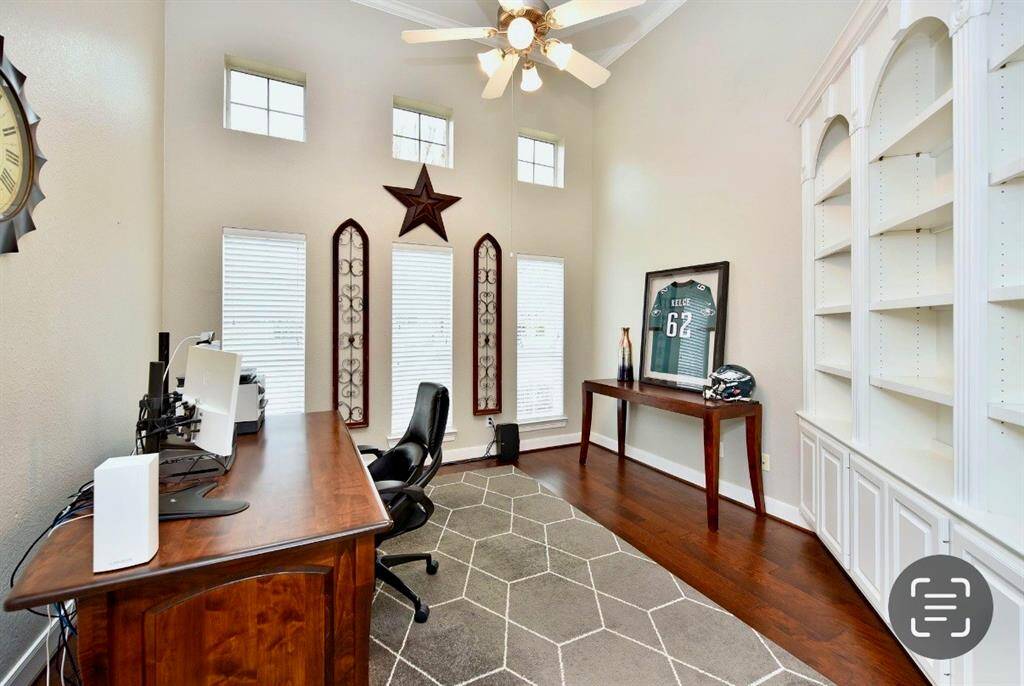 The primary office is ideally located near the soaring entry to take deliveries and welcome visitors.