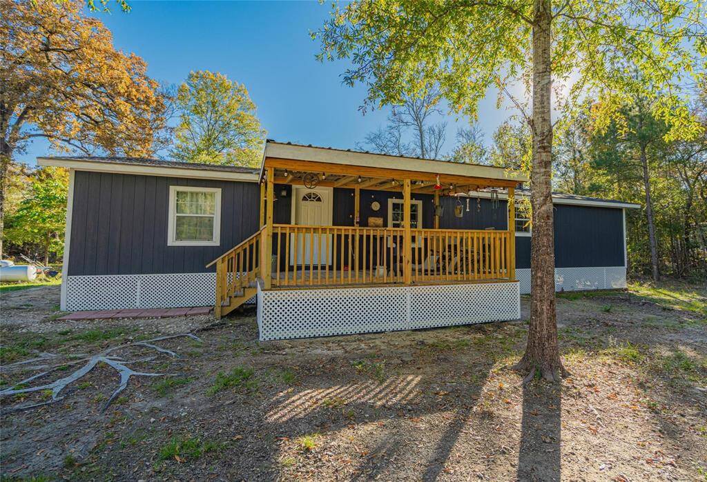 Front of house with covered porch