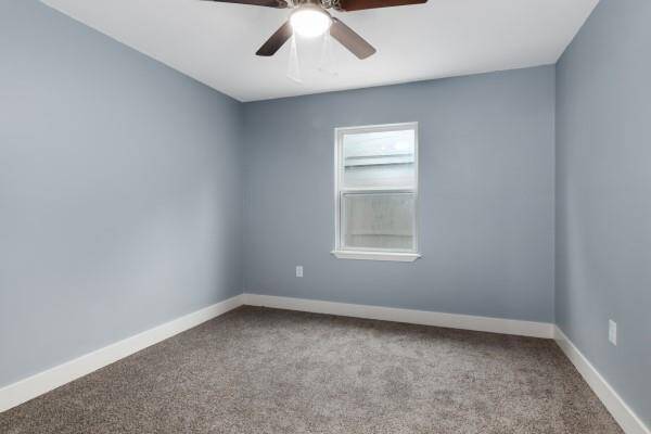 Master bedroom with plenty of natural light, recess lighting, and two built-in custom shelves.