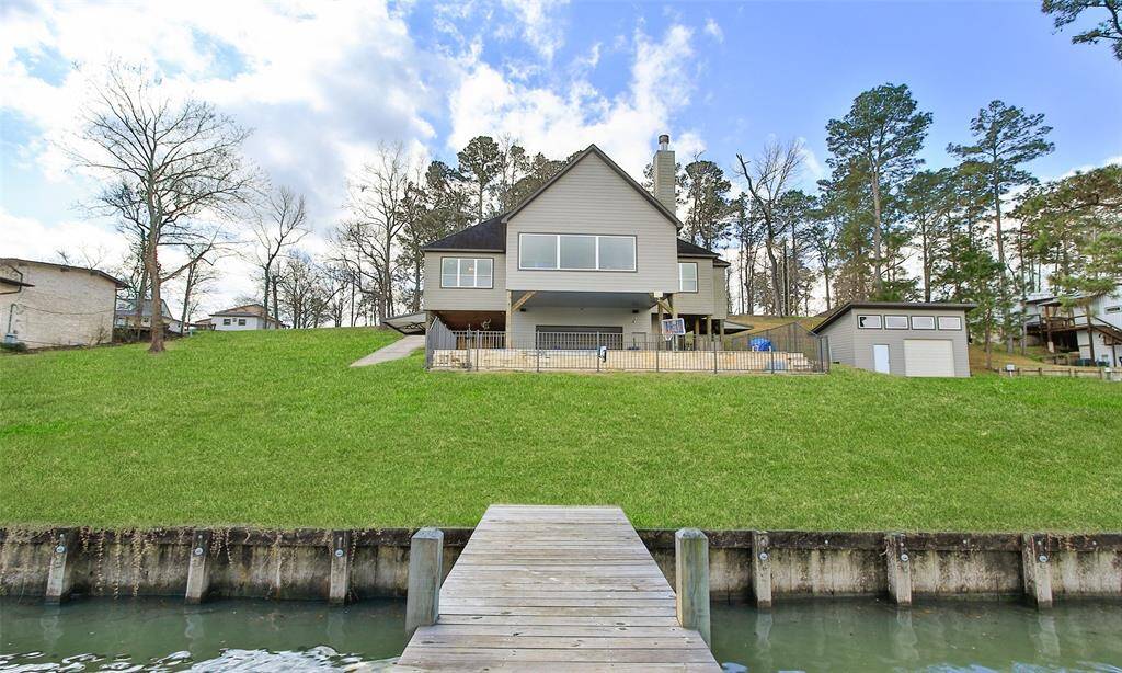 The building to the left is a great place for your lawn equipment.
