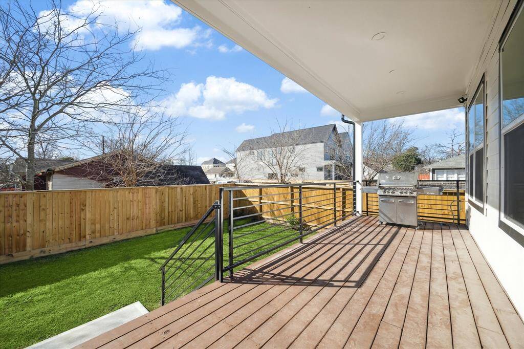 Exterior rear porch that runs the width of the house. Gas connection for a grill. And this porch is deep enough to actually fit furniture on which to sit or eat!