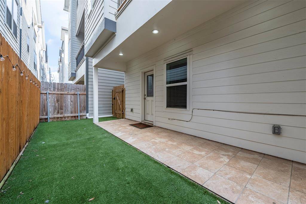 Great sized first floor patio with low maintenance turf