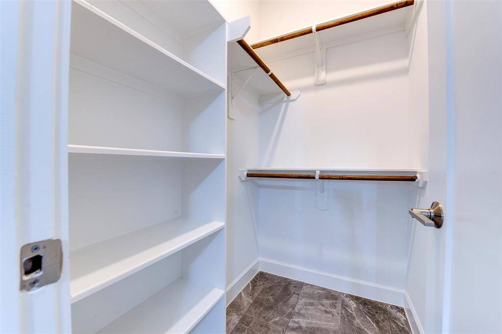 Walk-in closet in 1st floor room