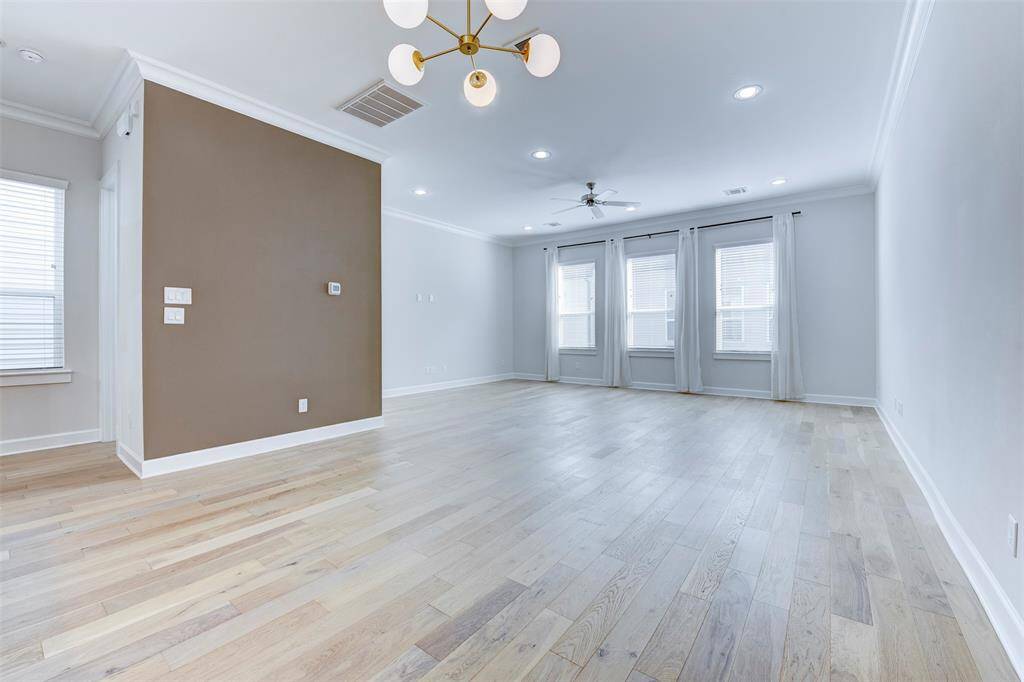 Beautiful living and dining combo with wood floors through out