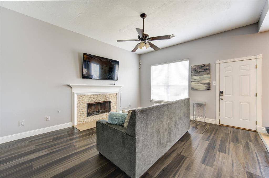 Gorgeous Flooring throughout Living Area with fireplace