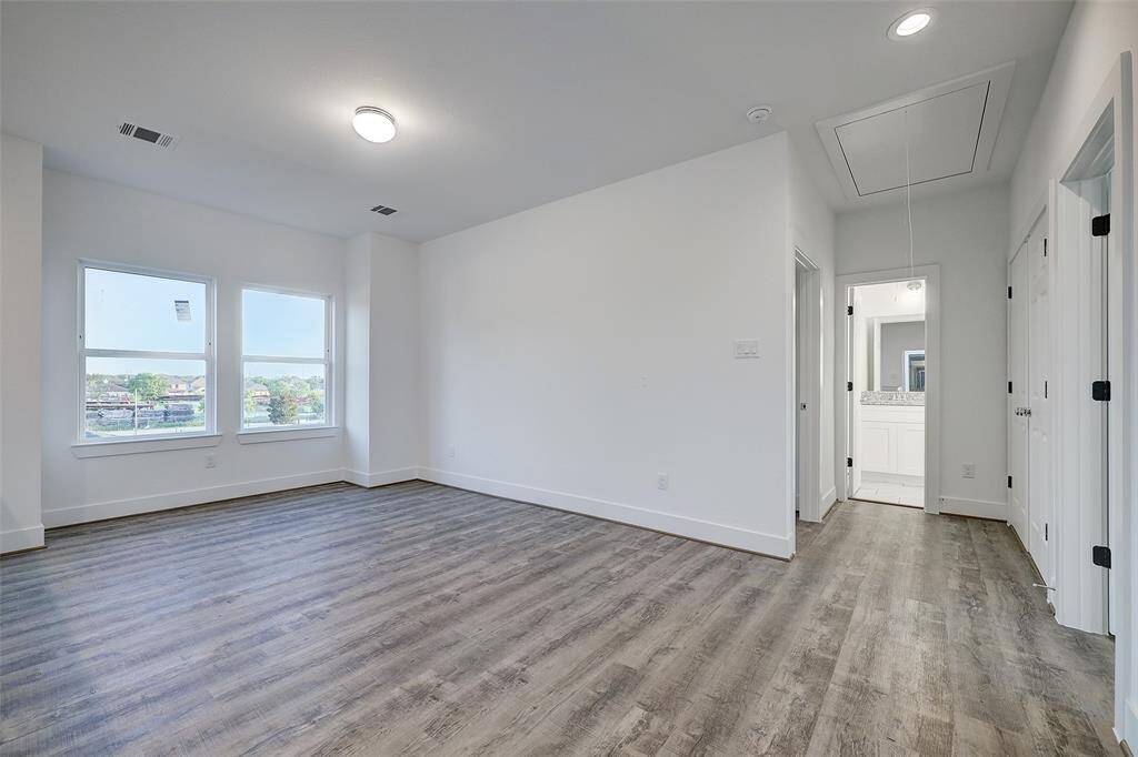 Atop the stair landing a large 12x15 game room offers the perfect space for a home office, a gym or a well-placed game room by your secondary bedrooms.