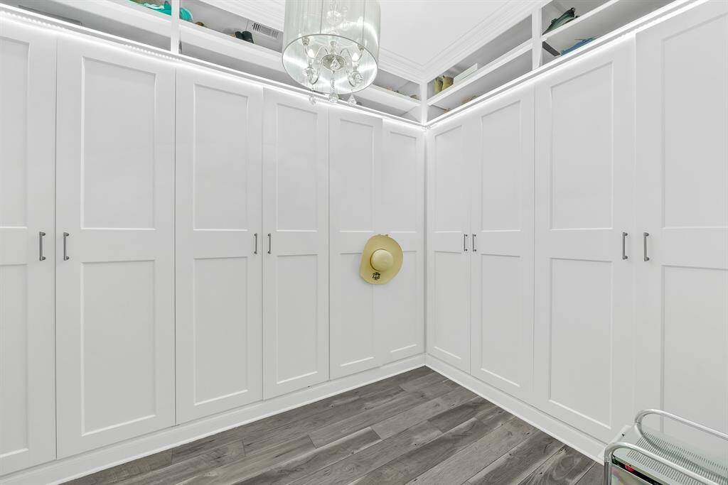 Primary closet with custom built-in closet