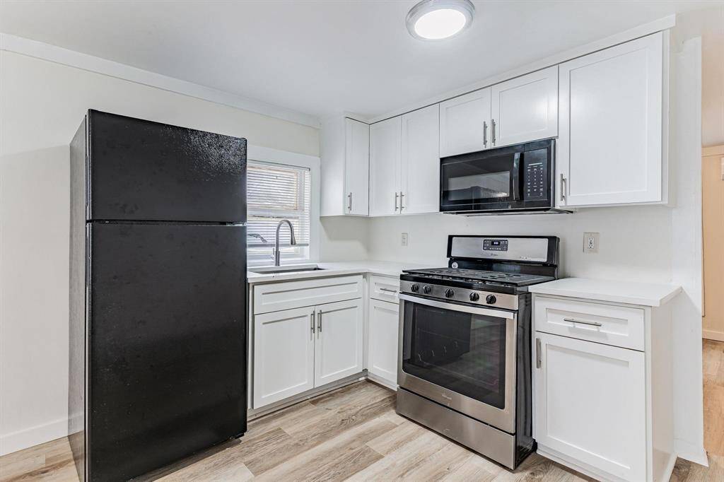 Beautifully updated kitchen with modern finishes and appliances.