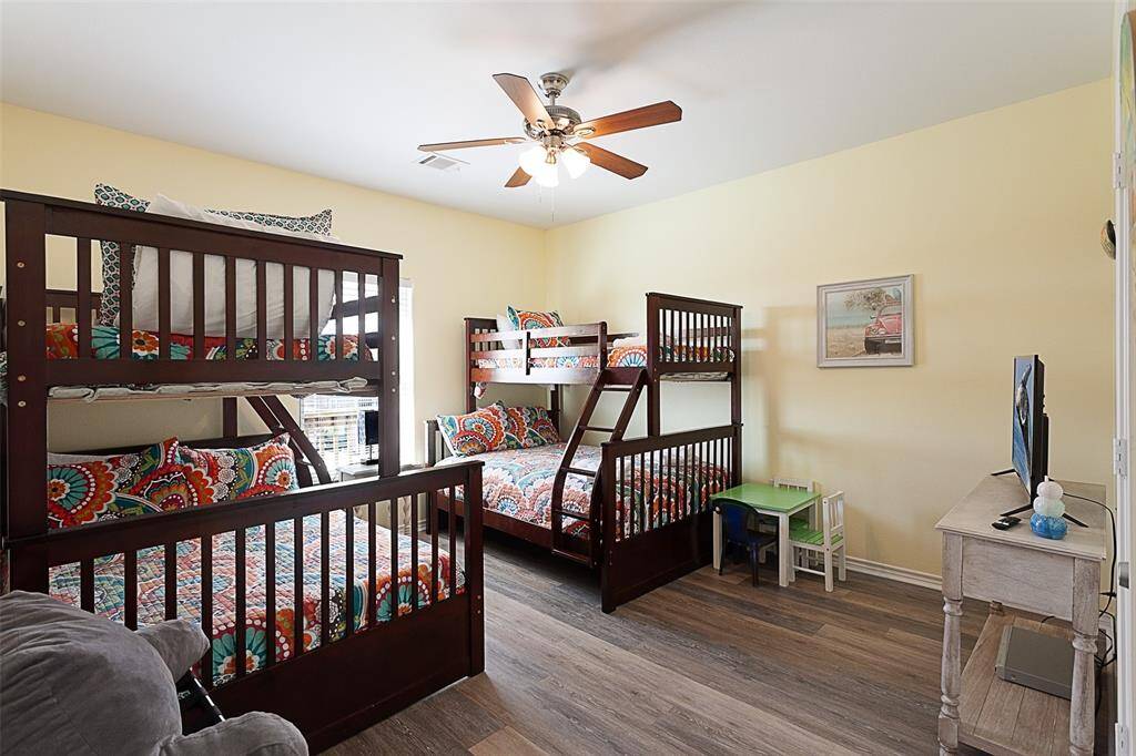 Bunk room can sleep up to six people--two twin beds and two full-size beds--and there's room to play too!
