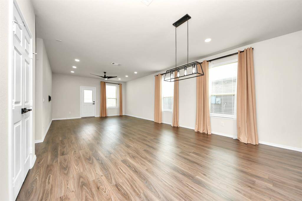 Expansive Living Area; Perfect for family gatherings. Recessed light additions.