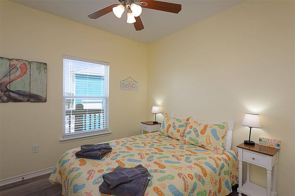 Third bedroom is equipped with a queen size bed.