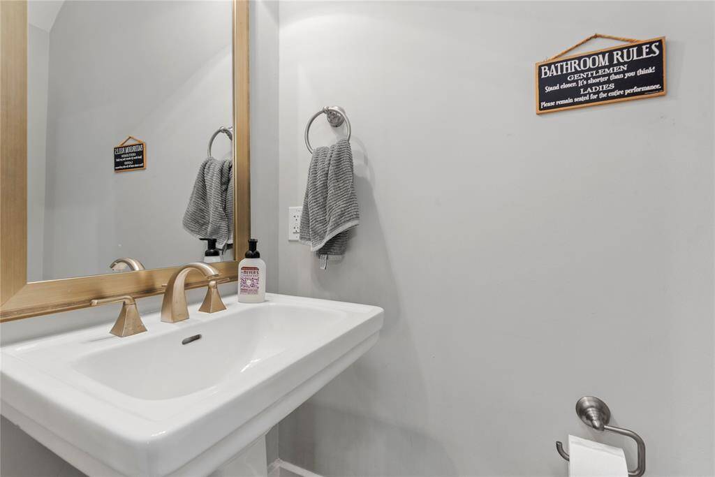A convenient half bath located on the main floor, perfect for visitors.
