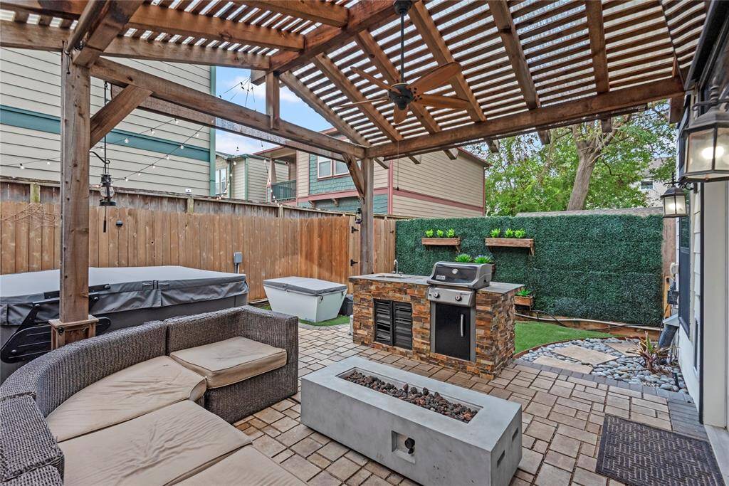An outdoor kitchen equipped with everything needed for al fresco dining and entertaining.