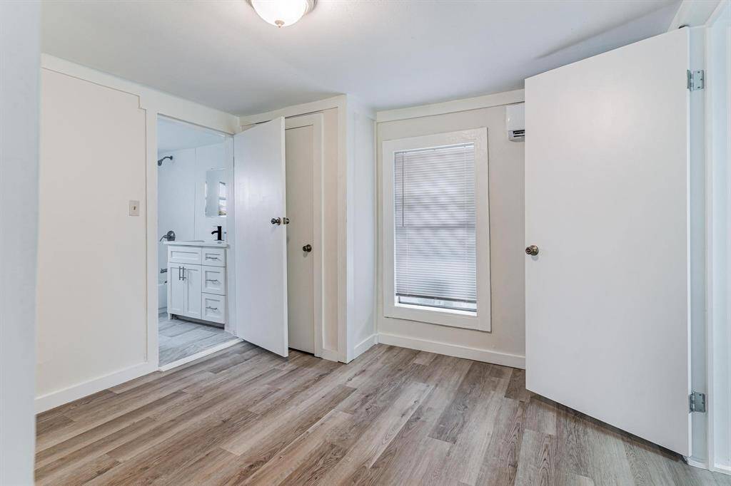 Bright and inviting living room with sleek flooring, modern finishes, and ample natural light. Perfect for relaxation and entertaining.