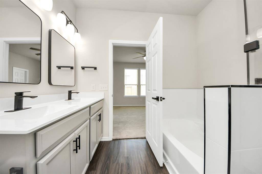 Master bathroom remodeled for modern luxury.