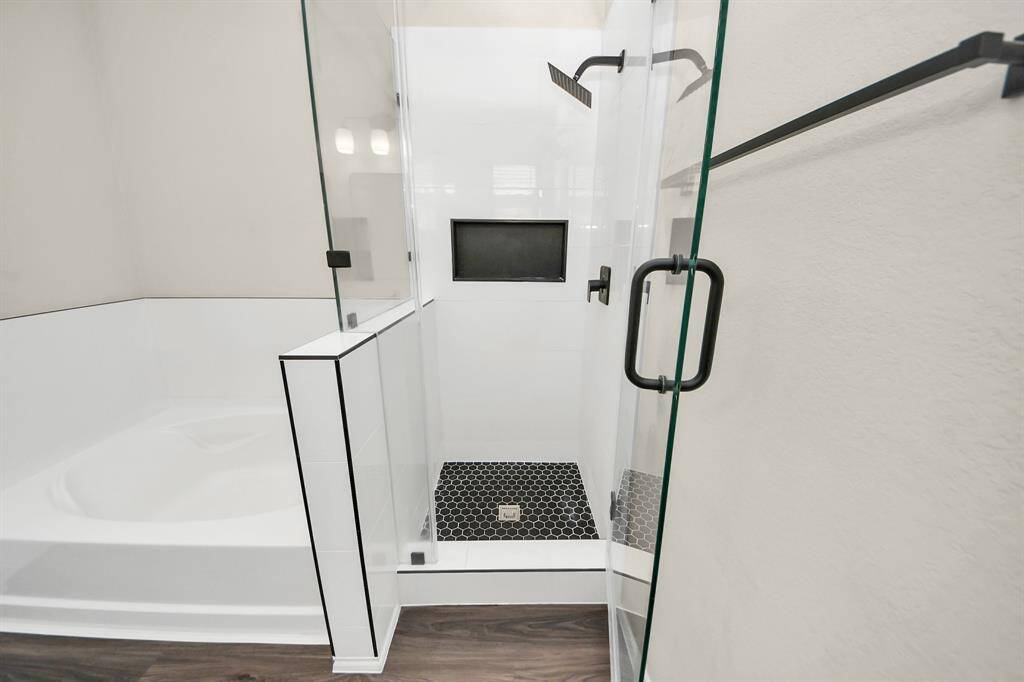 Master bathroom remodeled for modern luxury.