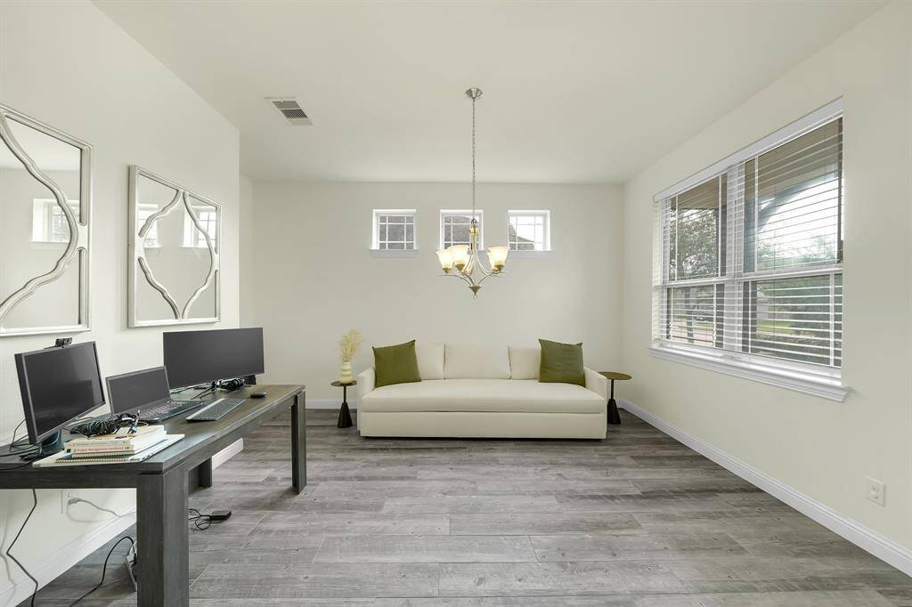 Formal dining room currently being repurposed as an office