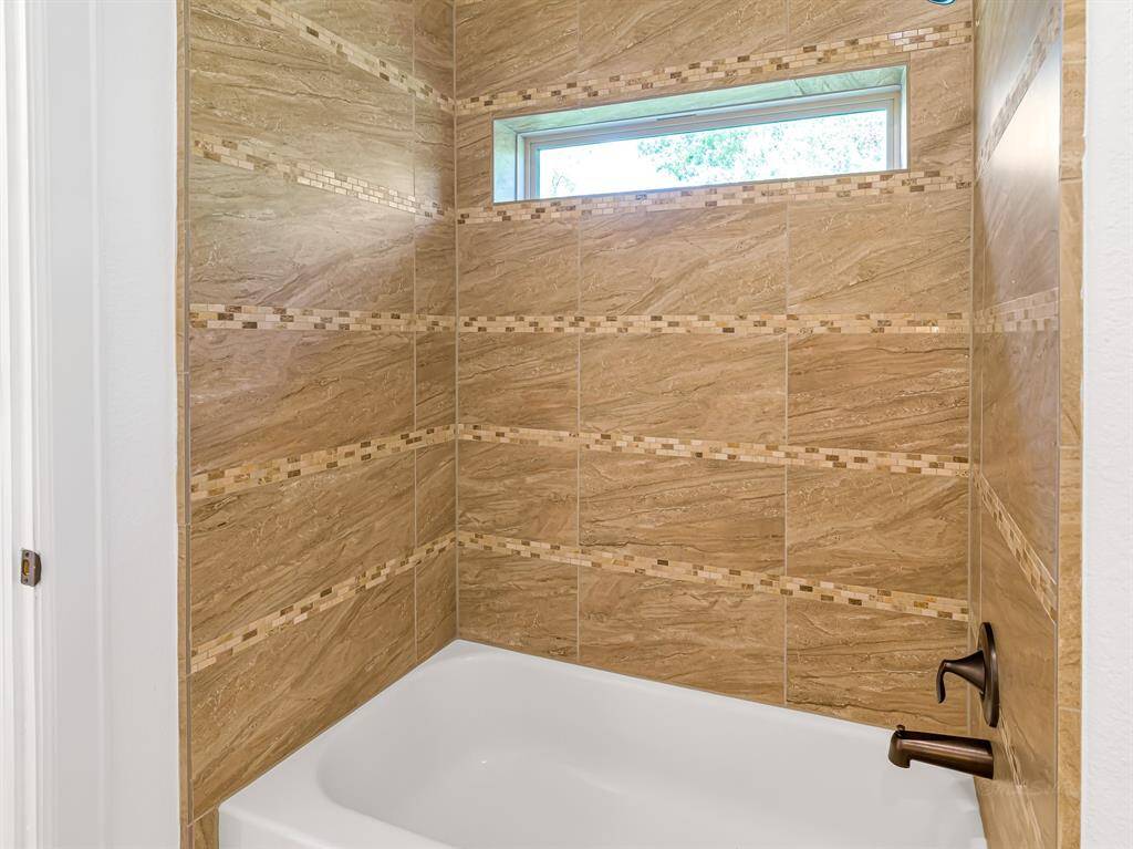 Beautiful custom tile in upstairs bathroom