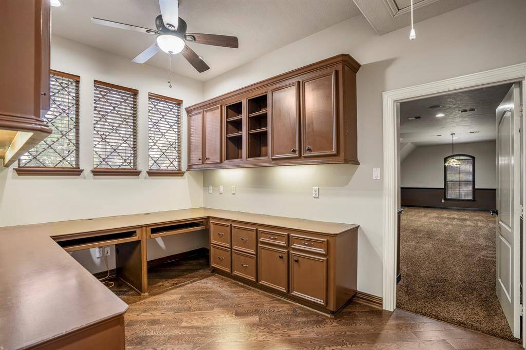 Just off the media room, you have the option of having an office / work from home option, with plenty of built-ins.