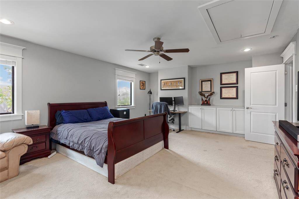 Another generously sized bedroom, offering comfort and style.
