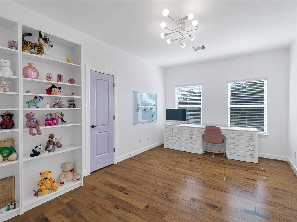 One of four upstairs bedrooms